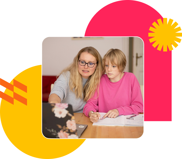 A parent helping a child with schoolwork